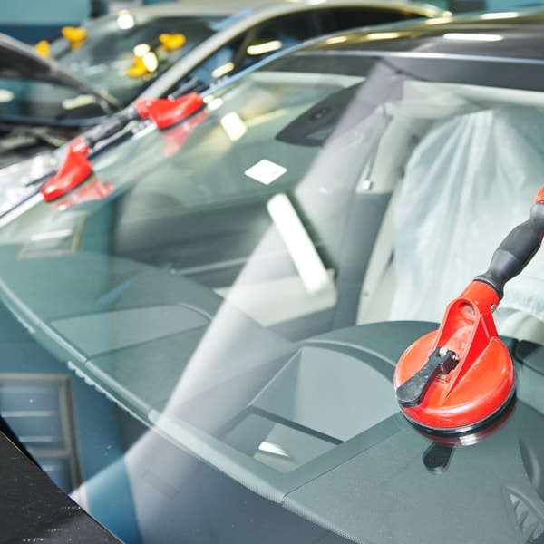 Which auto glass service to contact when windshield is broken  in Escambia County
